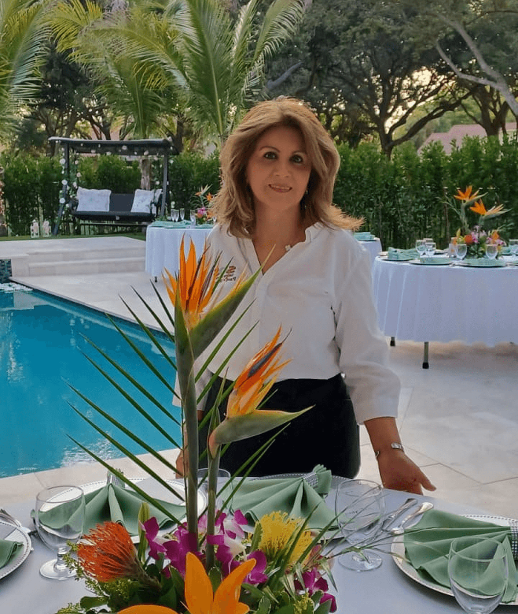 Sandra, owner of SOS Party Rental, preparing event decorations
