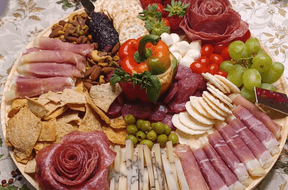 Delicious cheese and charcuterie board carefully prepared
